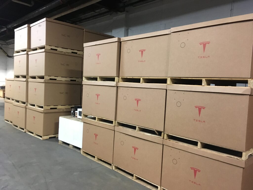 Barber Packaging corrugated kit/set-up boxes stacked on pallets at another angle