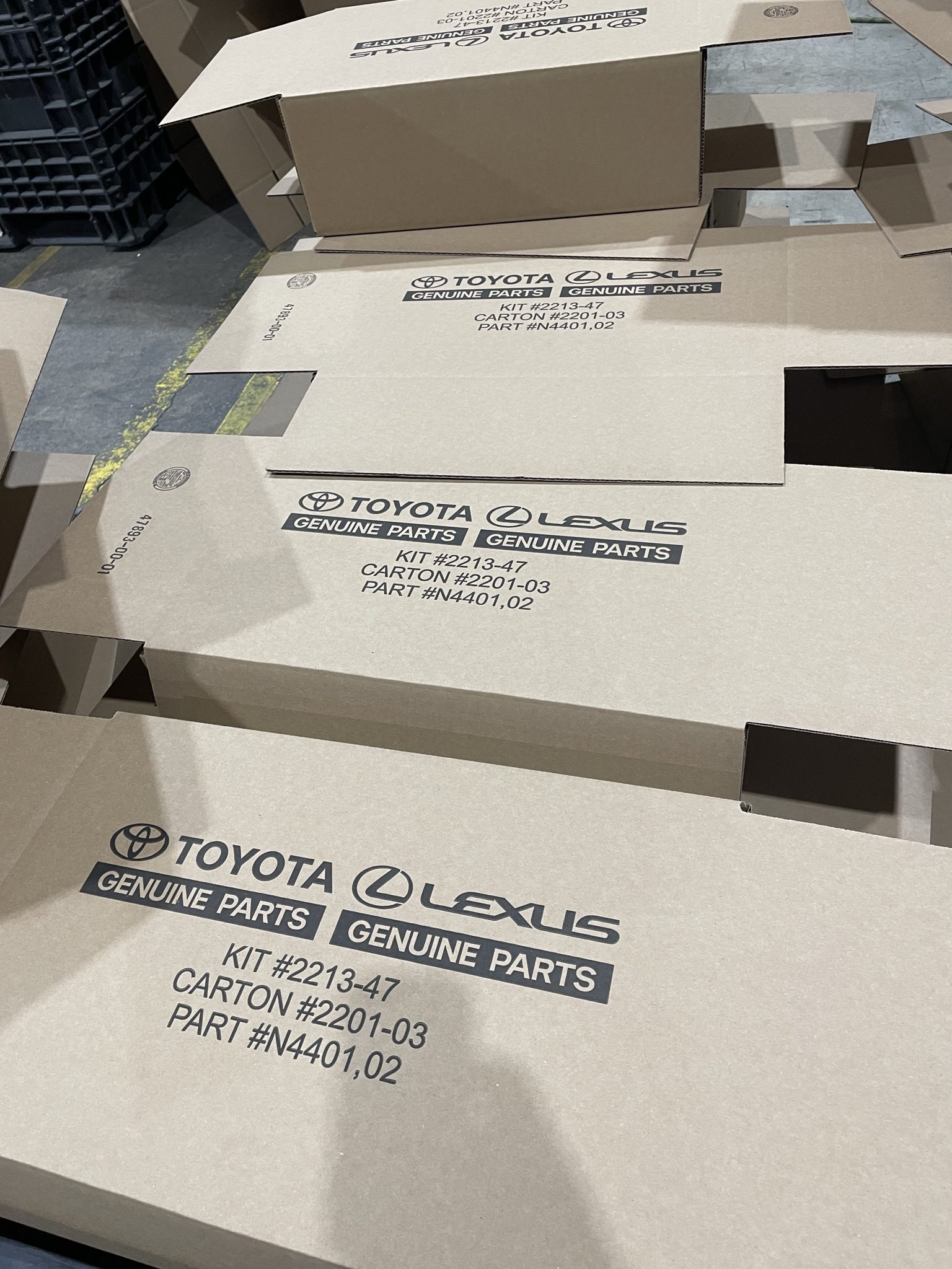 Barber Packaging corrugated kit/set-up box packaging in process of being assembled
