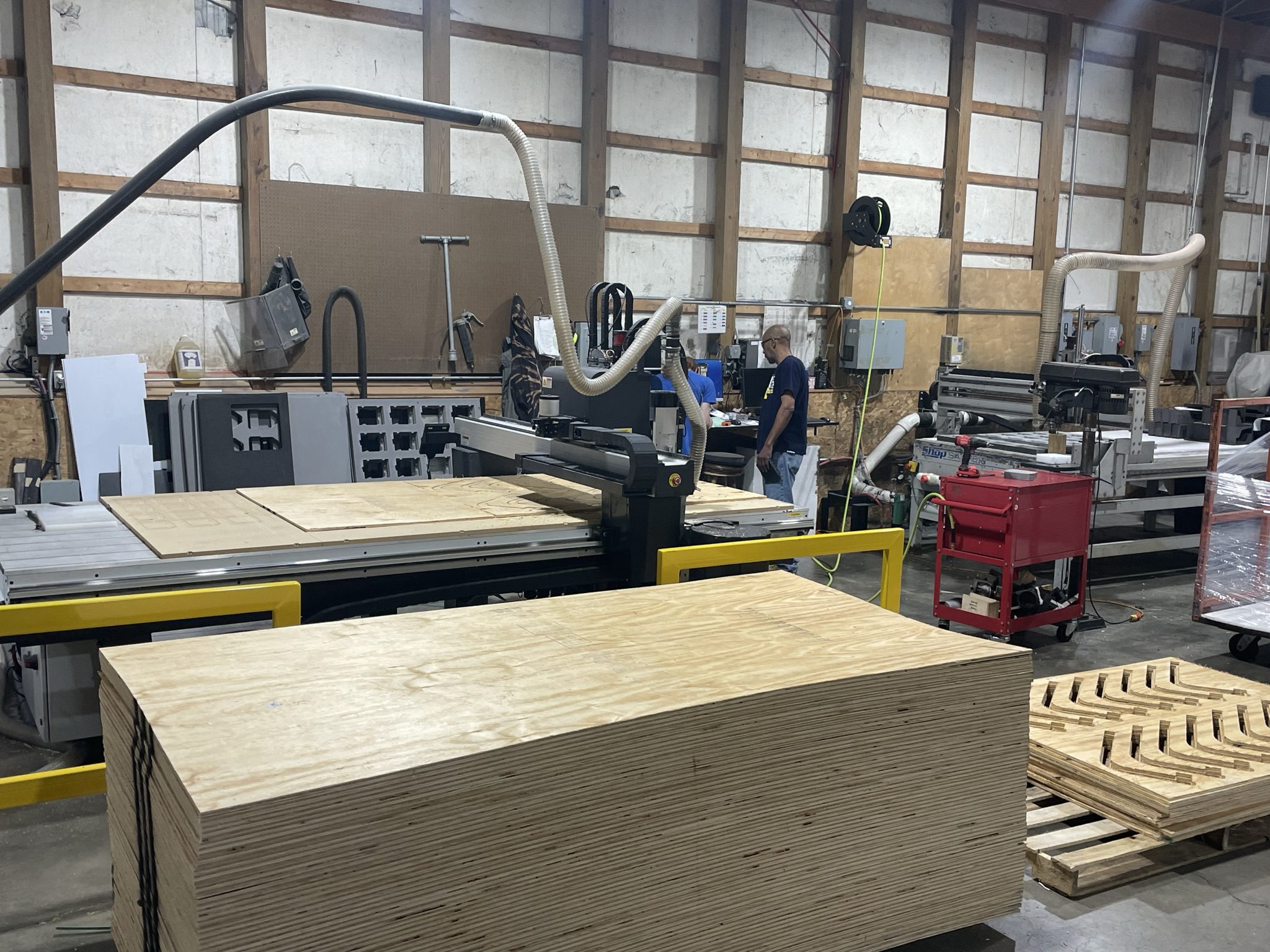 Barber Packaging wood inserts stacked on pallet